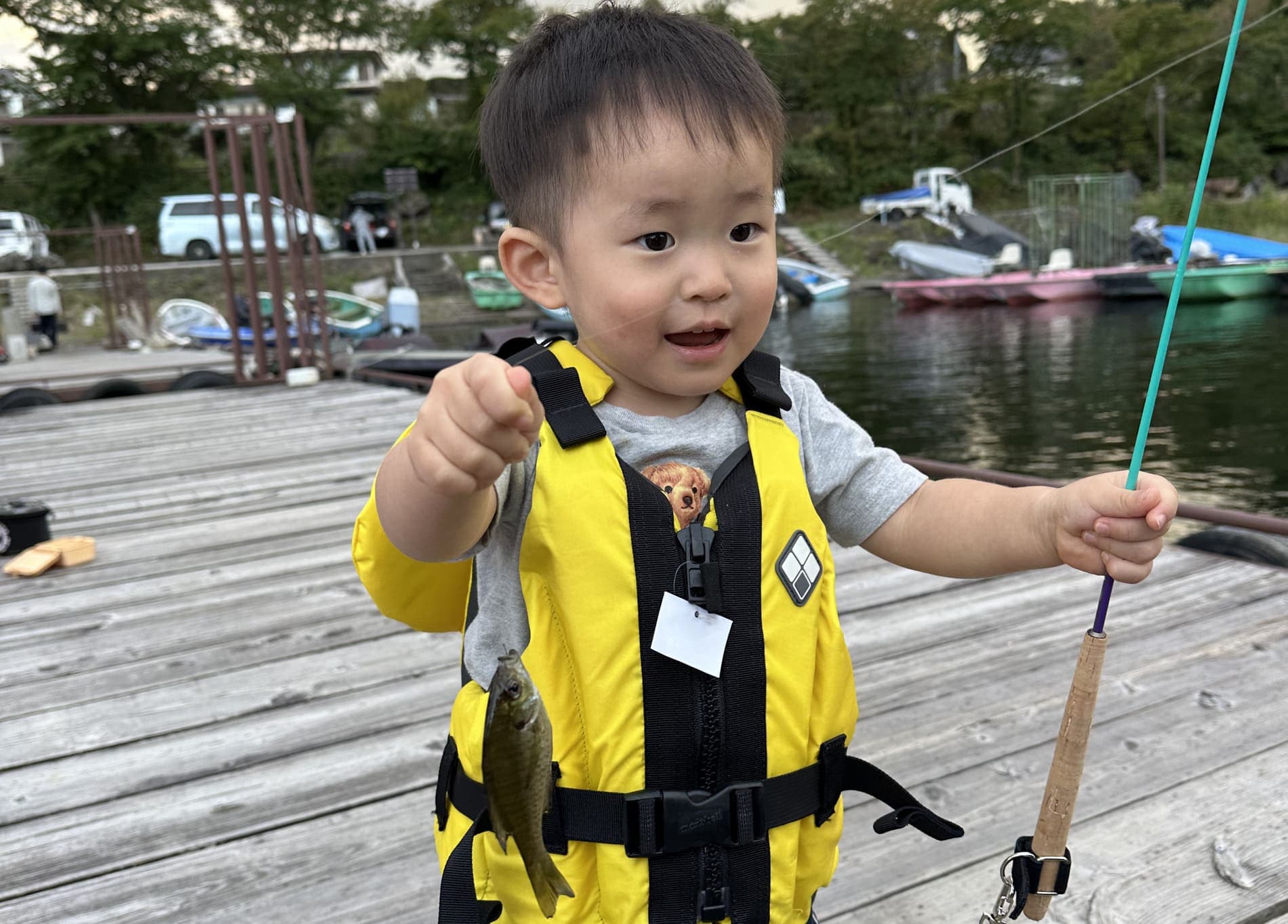 Family enjoying boat fishing at Lake Kawaguchi with Mt. Fuji view